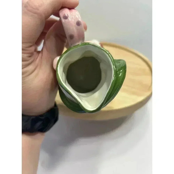 Fitz and Floyd Snowman Creamer from Frosty Folks Collection Holding Gift - Picture 6 of 7